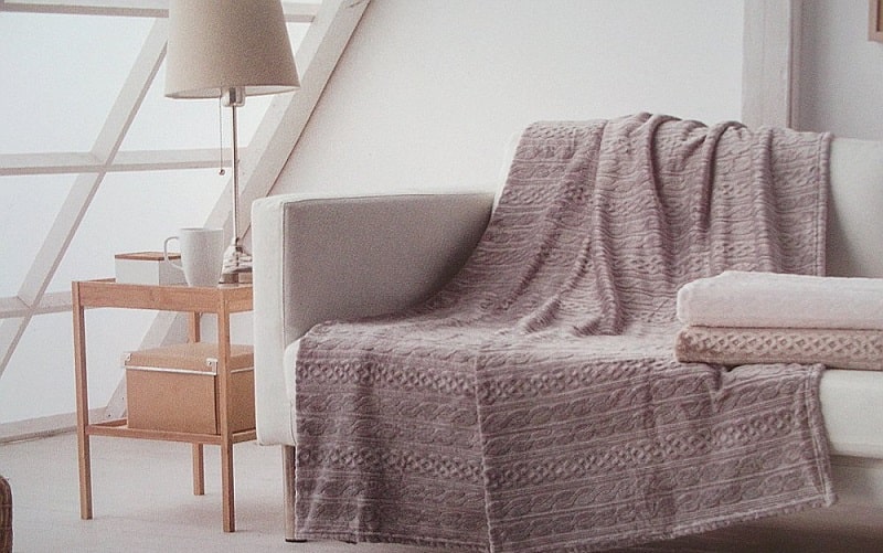 Diez formas de colocar un plaid en tu salón o dormitorio