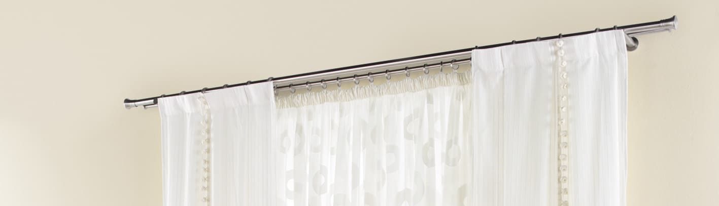 como hacer cortinas con tela con sujeción de aros